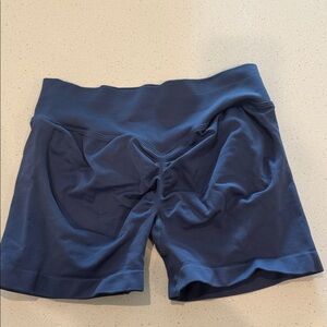 blue workout shorts with tummy tuck